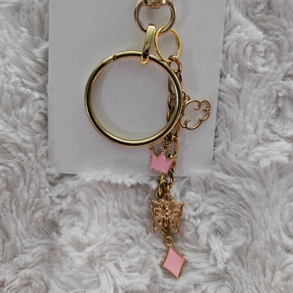 Adorable keychain with heart, dragonfly, key, and leaf charms - Picture 1 of 4